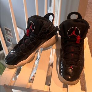 Young kids / Young Adults- Black and Red Jordan's Sneakers